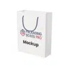 Custom white cardboard paper bag mockup with sleek design and branding.